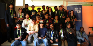 Die drei Gewinnerteams auf der Bühne